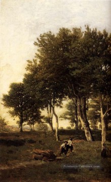  Barbizon Art - Paysage avec deux garçons portant du bois de chauffage Barbizon Henri Joseph Harpignies